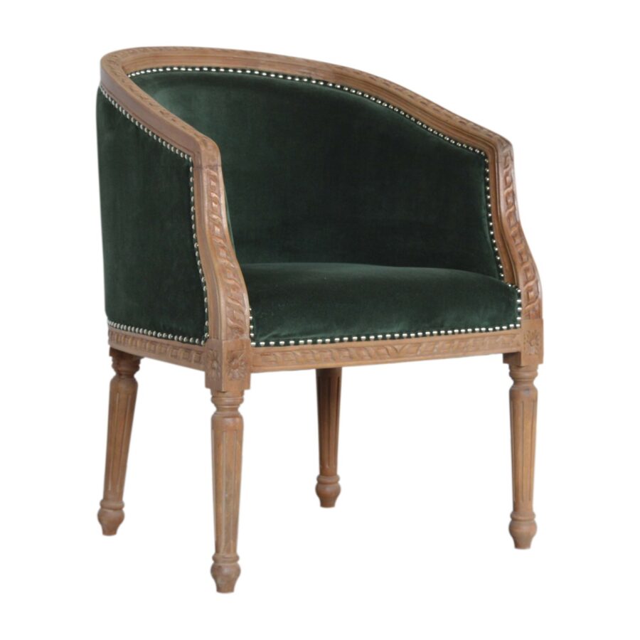 Chair with green velvet seat and wooden frame on a white background