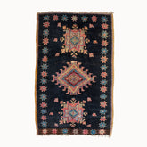 Decorative rug with geometric pattern on a white background