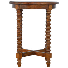 Wooden side table with spiral legs on a white background