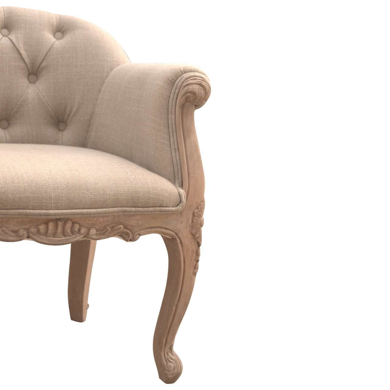 Beige armchair with decorative carvings on a white background