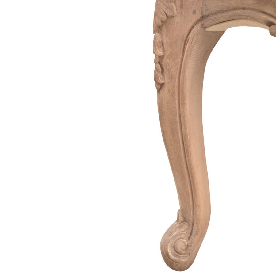 Wooden mirror frame with intricate carvings on a white background