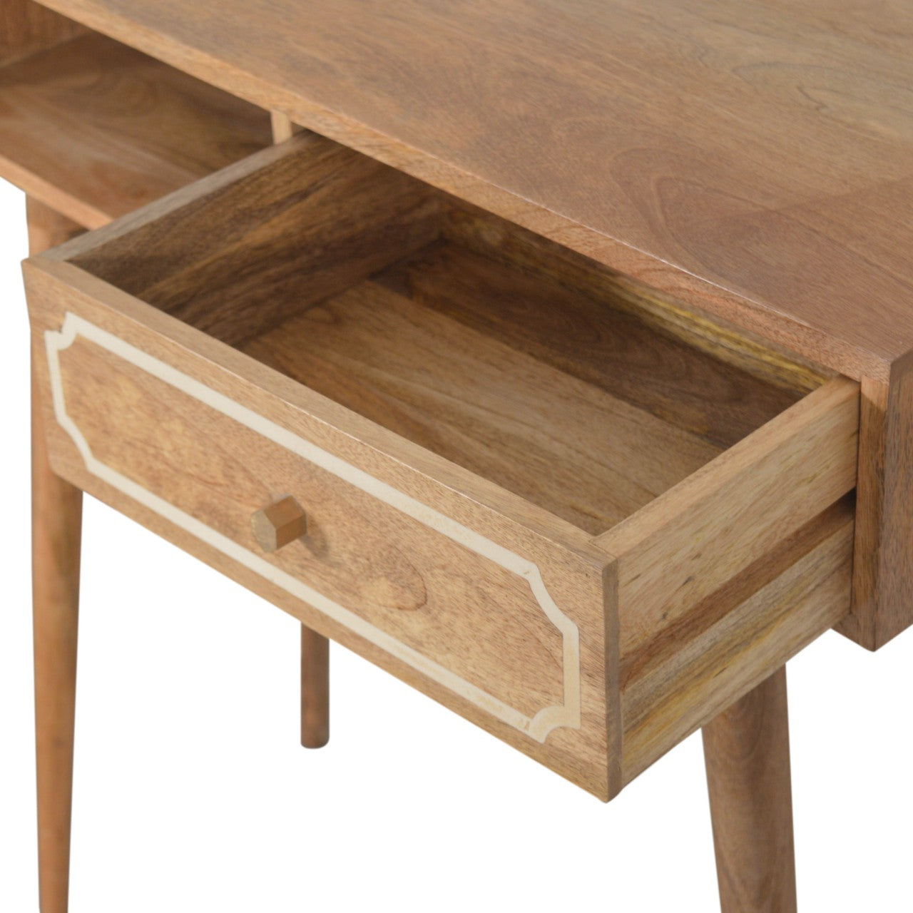 Wooden side table with a drawer on a white background