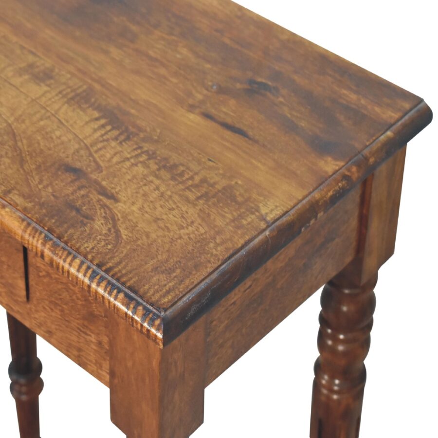 Wooden table with a worn surface on a white background
