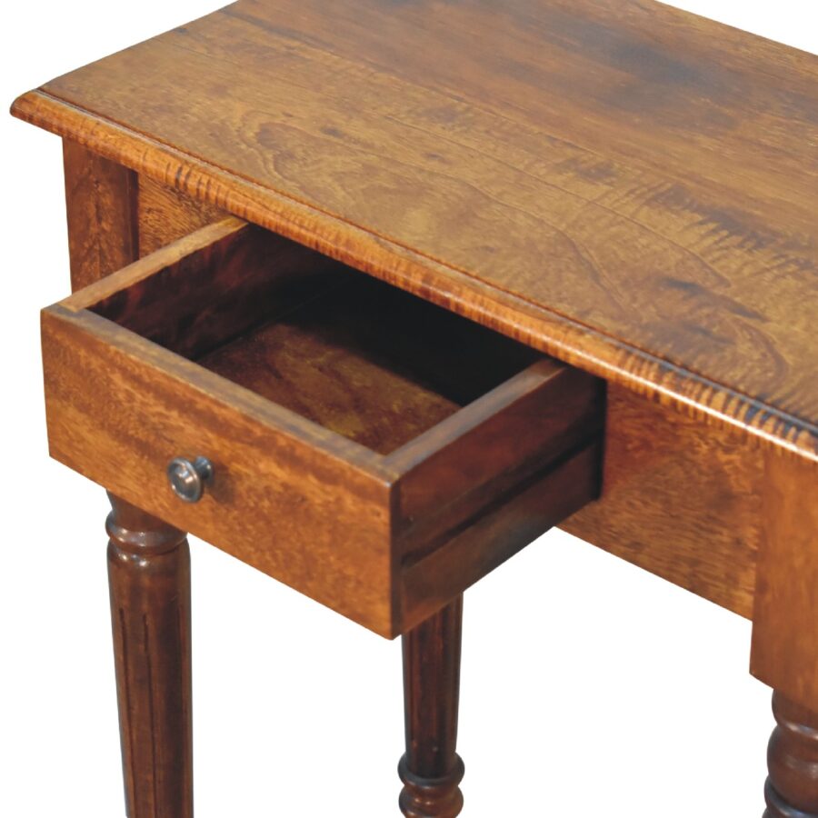 Wooden table with a drawer on a white background