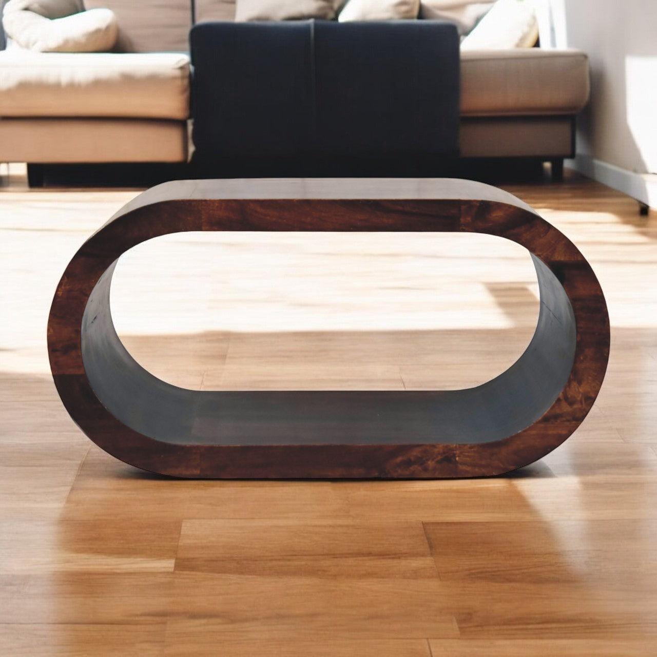 Modern coffee table with wooden and glass design in a living room setting