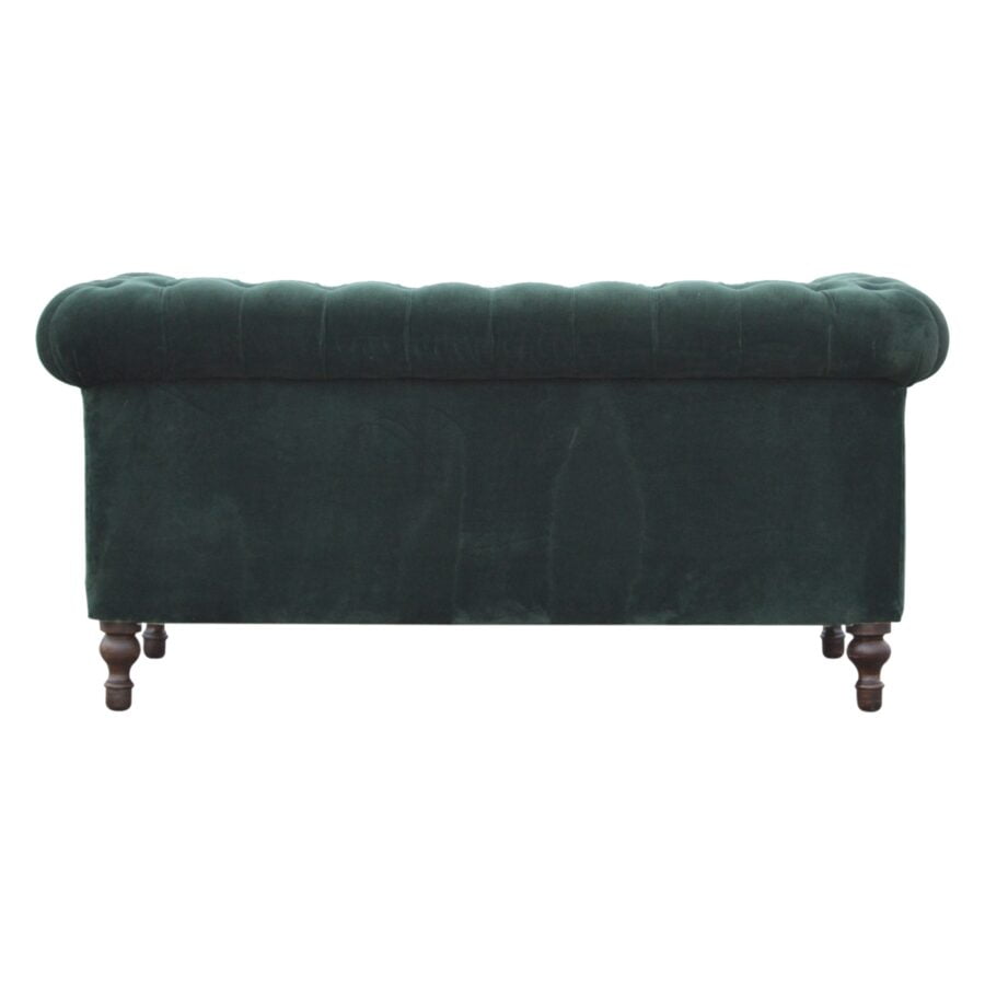 Green velvet bench with tufted backrest on a white background