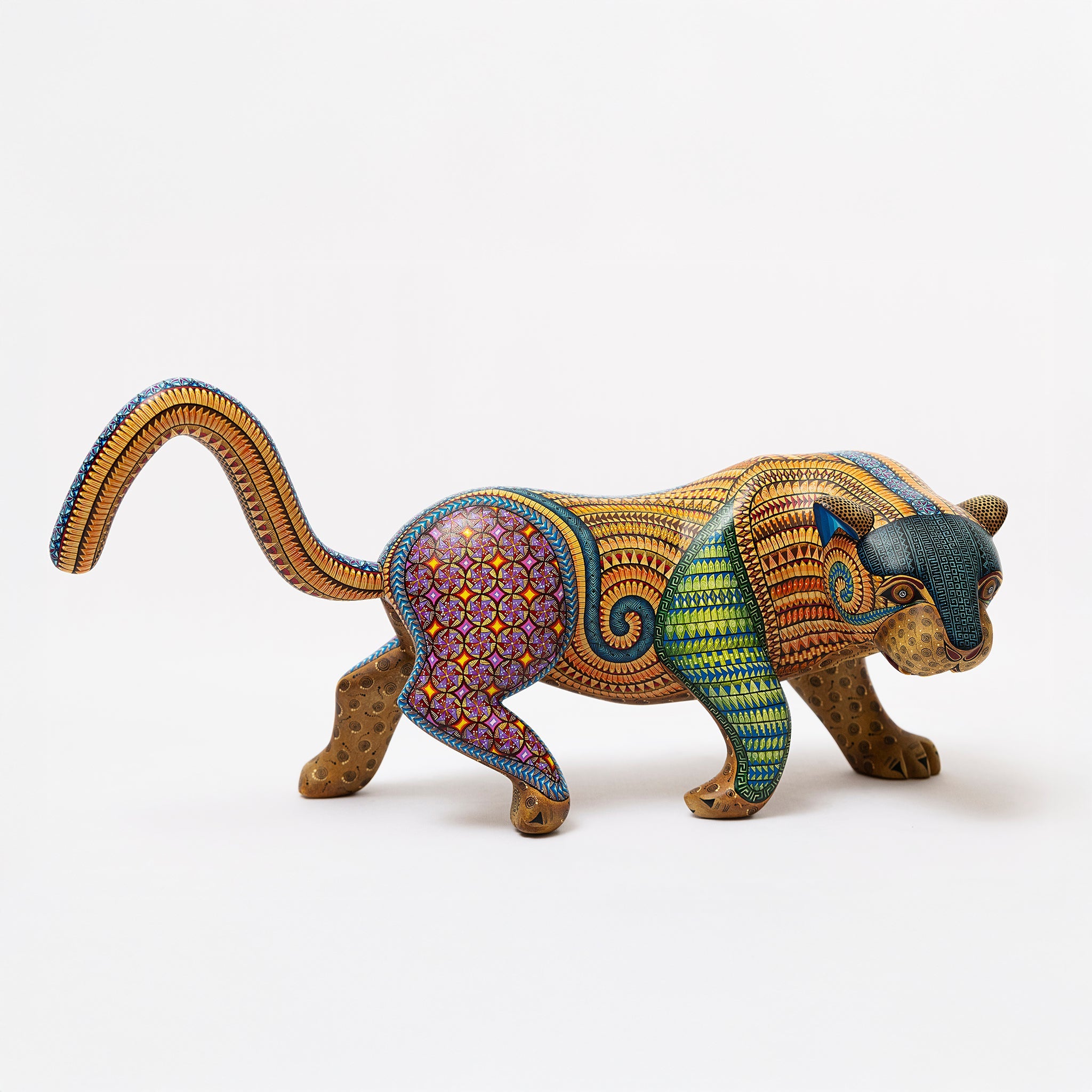 Colorful panther figurine on a white background