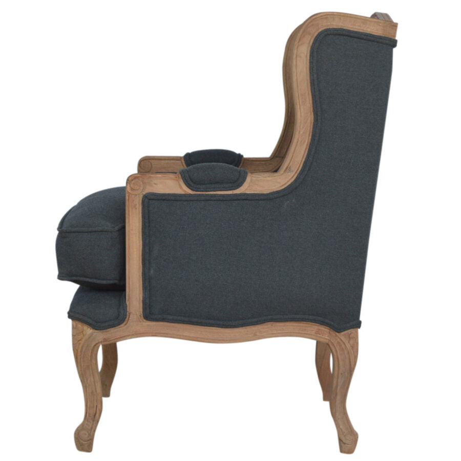 Chair with dark blue upholstered back and seat on a white background