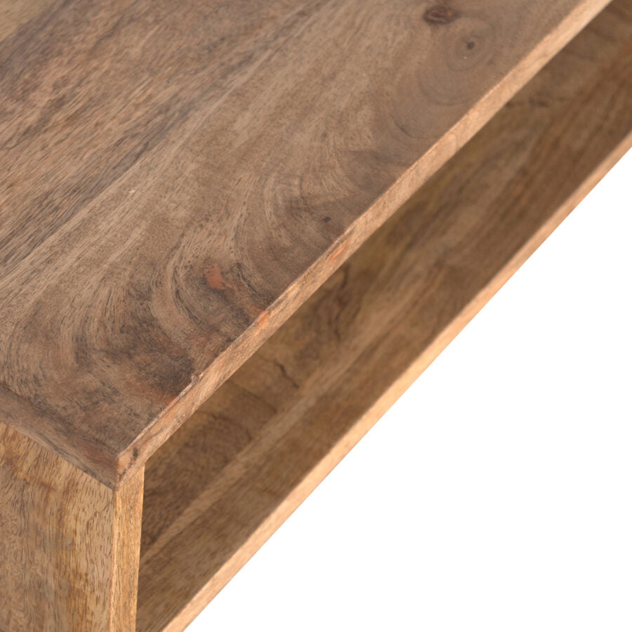 Close-up of a wooden shelf with a natural finish on a white background